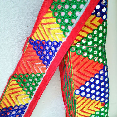 Red Mirrored Fabric Trim With Yellow, Orange , Green And Blue Embroidery With Mirrors